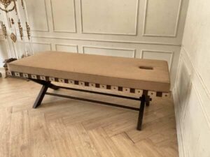 Spa massage bed, wooden legs, brown fabric cushion
