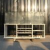 Product shelves, shelves with glass cabinet shelves, white wooden frame.