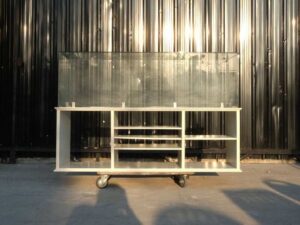 Product shelves, shelves with glass cabinet shelves, white wooden frame.