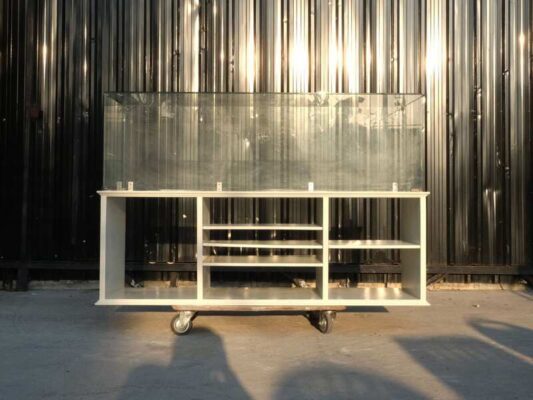 Product shelves, shelves with glass cabinet shelves, white wooden frame.