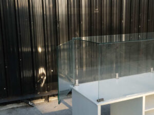 Product shelves, shelves with glass cabinet shelves, white wooden frame.