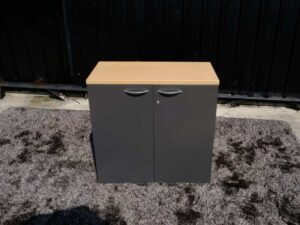 Document cabinet, 2 doors, open, cream-gray color, wooden top