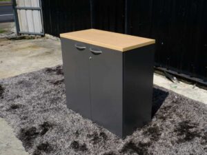 Document cabinet, 2 doors, open, cream-gray color, wooden top