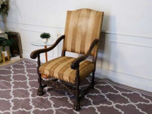 High back armchair, Louis style, cream colored fabric cushion. European work comes from Germany.