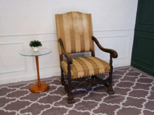 High back armchair, Louis style, cream colored fabric cushion. European work comes from Germany.