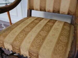 High back armchair, Louis style, cream colored fabric cushion. European work comes from Germany.