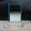 Shelf, 3-level product shelf, blue steel frame The bottom shelf has a hanging rail and has 2 storage drawers.