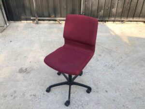 Office chair, red fabric cushion, Modernform brand.