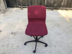 Office chair, red fabric cushion, Modernform brand.