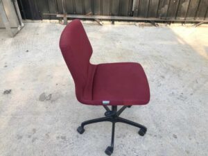 Office chair, red fabric cushion, Modernform brand.
