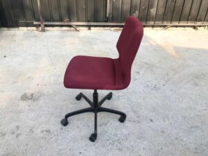 Office chair, red fabric cushion, Modernform brand.