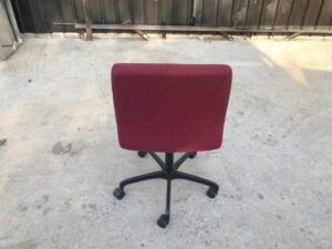 Office chair, red fabric cushion, Modernform brand.