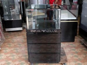 Jewelry cabinet, glass cabinet to display products Square shape, 1 glass door opening, black wooden base.