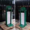 Tall product holder Product display box, 2 sides, green wooden frame. Attached to clear acrylic