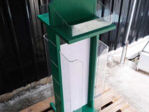 Tall product holder Product display box, 2 sides, green wooden frame. Attached to clear acrylic