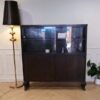 Wooden display cabinet, glass top, walnut color, European workmanship, sourced from Germany.