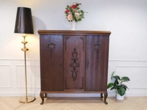 2-door storage cabinet, walnut wood color, European workmanship, from Germany.