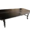 Work desk, 4 seats, steel frame, wooden top, black, with wheels.
