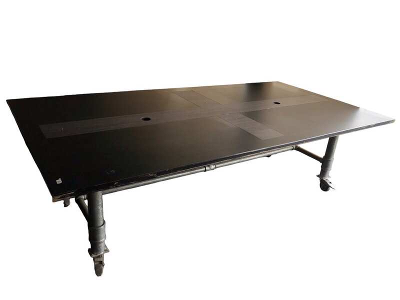 Work desk, 4 seats, steel frame, wooden top, black, with wheels.
