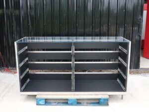 Large counter, 180 cm glass top, left-right marble walls. Wooden base, stainless steel edge