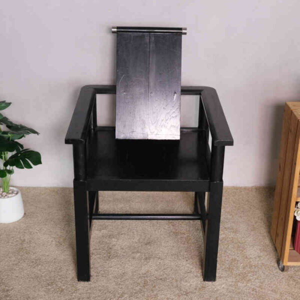Black wooden armchair, beautiful and exotic design.
