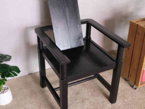 Black wooden armchair, beautiful and exotic design.