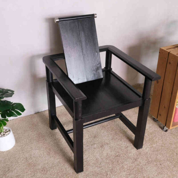 Black wooden armchair, beautiful and exotic design.