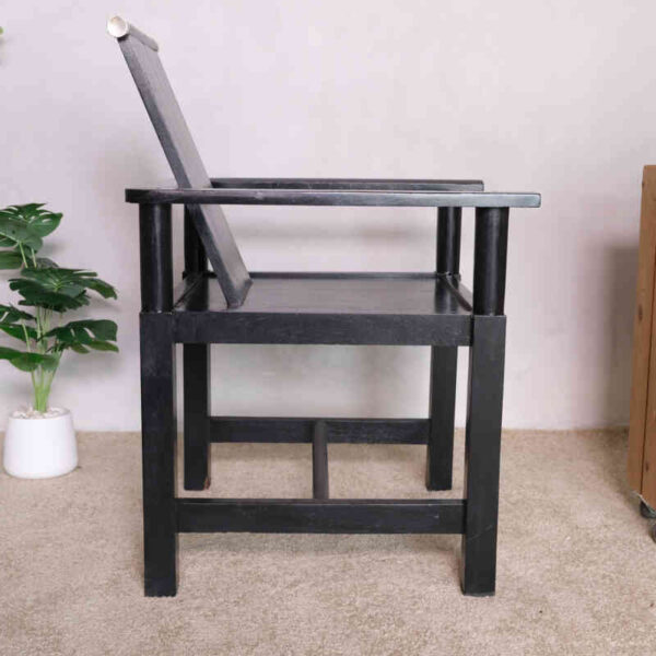Black wooden armchair, beautiful and exotic design.
