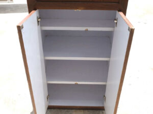 4 wooden product shelves (brown-white) with storage cabinets at the back.