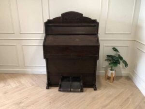 Antique piano, walnut color, European made from Germany.
