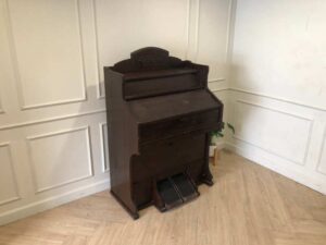 Antique piano, walnut color, European made from Germany.