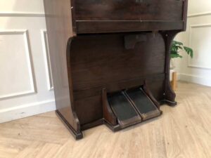 Antique piano, walnut color, European made from Germany.