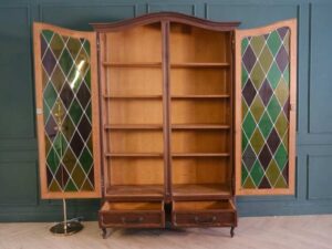 Bookcase, 2 doors, 2 drawers, mahogany color European work comes from Germany.