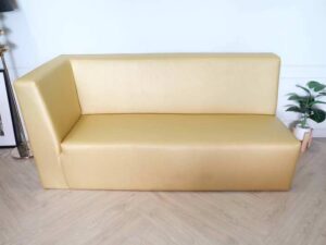 Three-seater leather sofa, beautiful shade, wooden frame, golden yellow color.