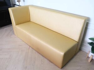 Three-seater leather sofa, beautiful shade, wooden frame, golden yellow color.