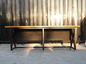 Work desk, 2 seats, wooden top, steel legs, with wheels.