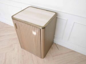 Wooden cabinet, 1 door, square shape Modern, luxury style, brown with gold stainless steel edges.