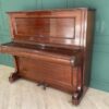 Hornung & Moller grand piano, made in Germany, plays normally on all keys.