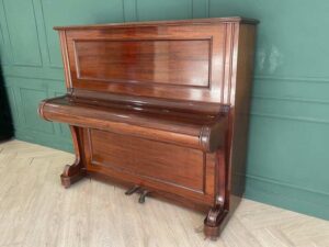 Hornung & Moller grand piano, made in Germany, plays normally on all keys.