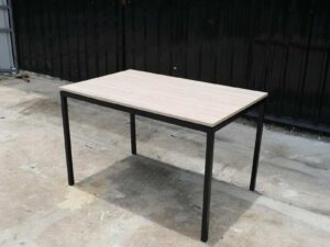 Multipurpose table, wood pattern top, black steel leg frame.