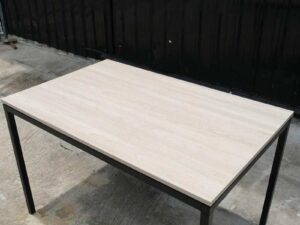 Multipurpose table, wood pattern top, black steel leg frame.