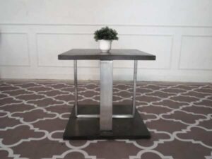 Square side table, wood top, stainless steel legs, hotel furniture.