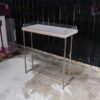 Tall wooden product display tray, attached to a clear acrylic frame. Product shelves, steel leg frame
