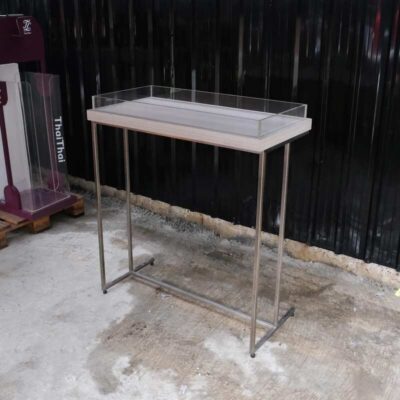 Tall wooden product display tray, attached to a clear acrylic frame. Product shelves, steel leg frame