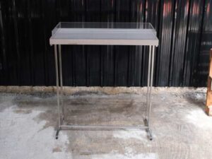 Tall wooden product display tray, attached to a clear acrylic frame. Product shelves, steel leg frame
