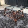 Rattan center table, glass top