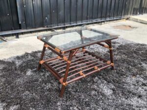 Rattan center table, glass top