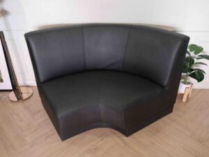 Curved sofa, covered with silk leather, wooden frame, black