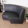 Curved sofa, covered with silk leather, wooden frame, black