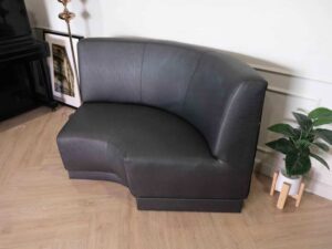 Curved sofa, covered with silk leather, wooden frame, black